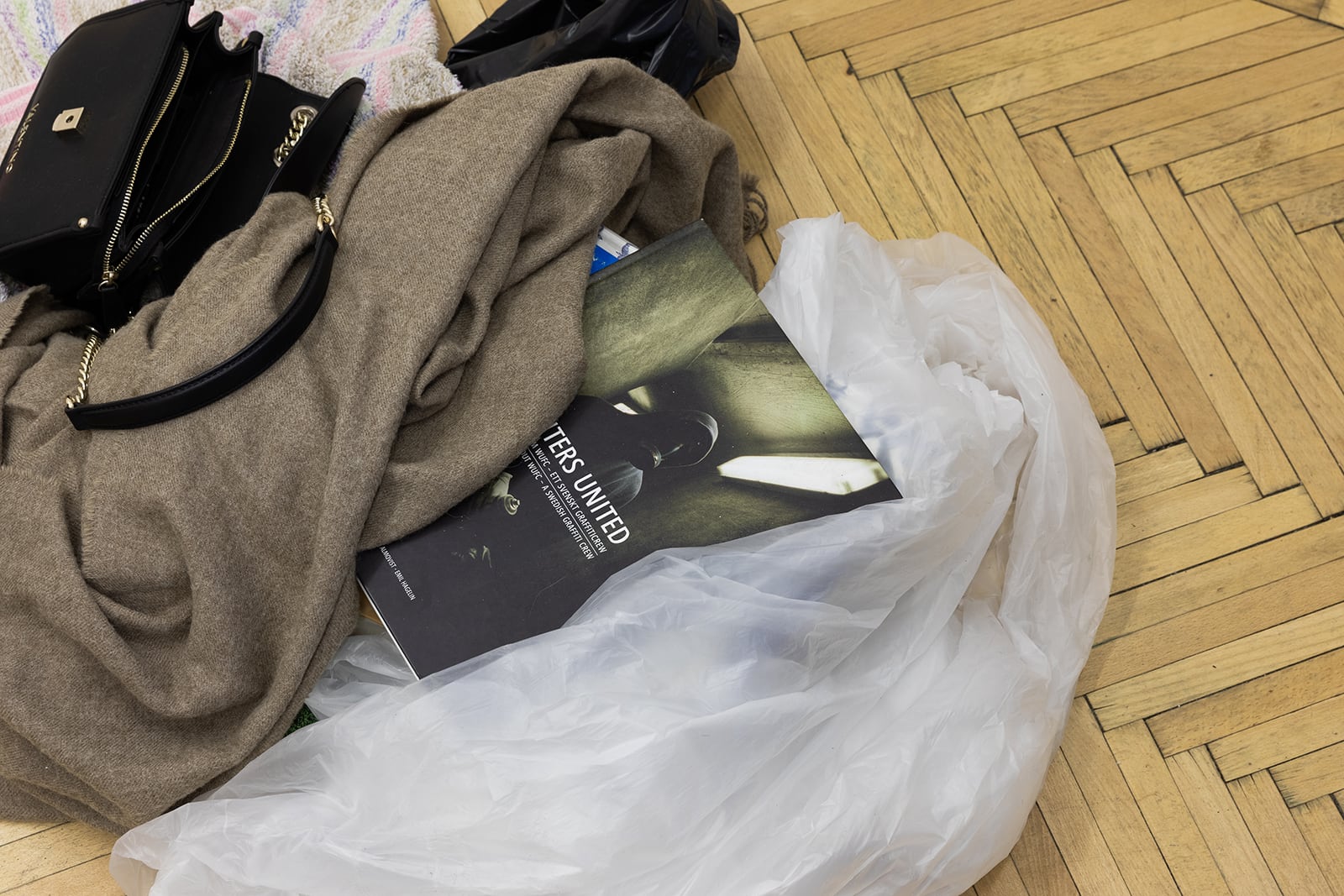 Mira Winding, Uuf (detail), 2022, Valentino bag, graffiti books, plastic, mixed media, 18 x 70 x 100 cm
