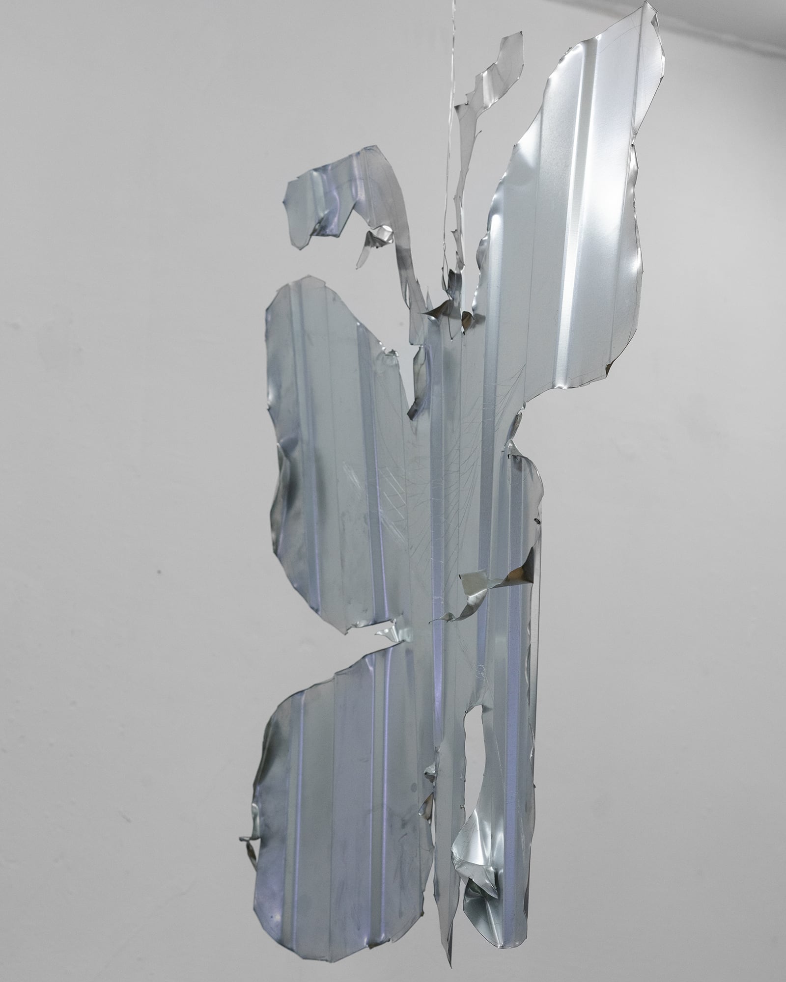 Nika Temeeva, Iron Butterfly II, 2022, cut out figure on corrugated steel sheet, 60 x 75 cm